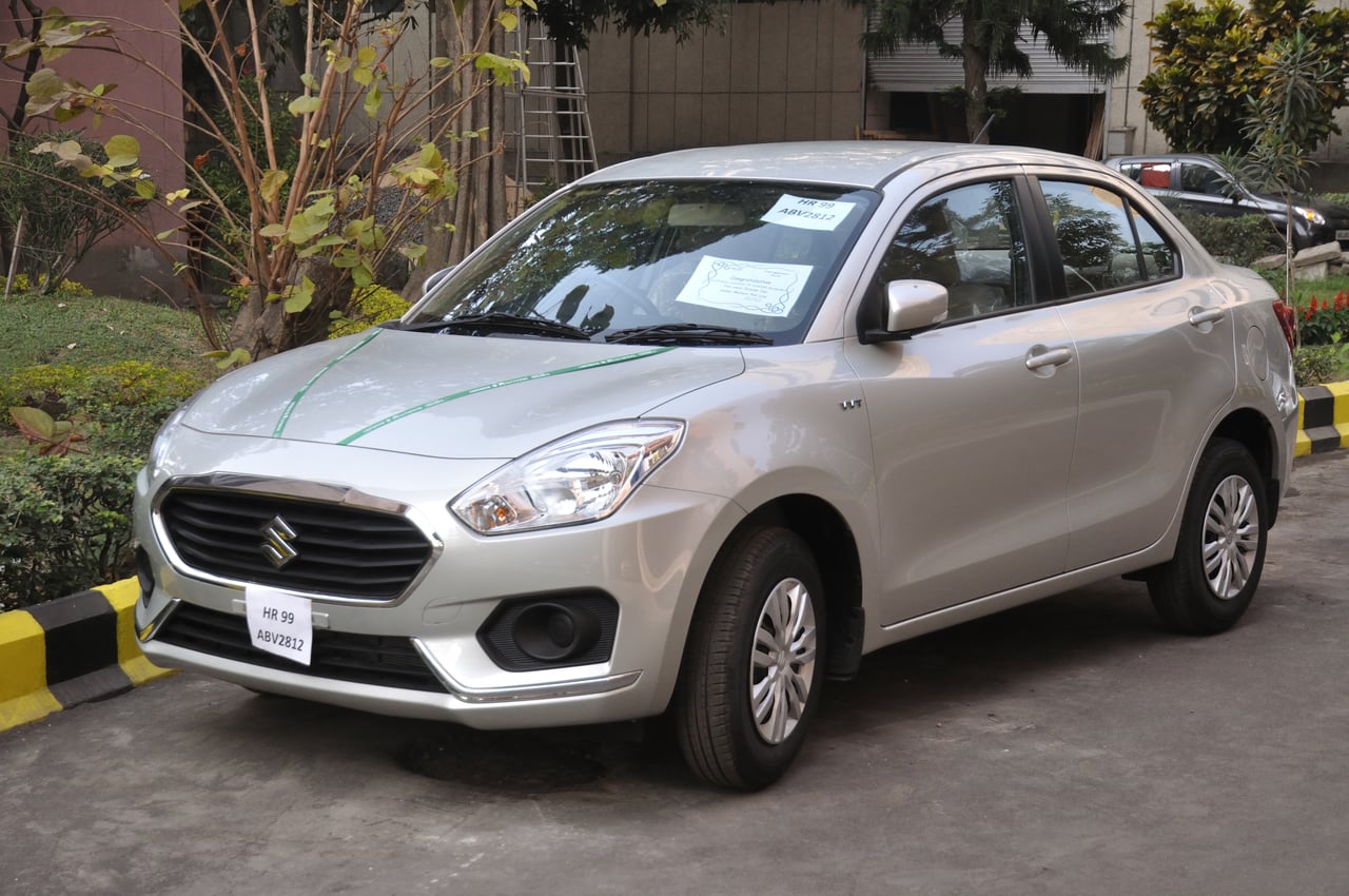 Maruti Suzuki Tour S Dzire CNG commercial cab operating on Delhi-Gurgaon expressway corridor